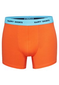 Oranje boxer shorts met een zachte textuur, voorzien van een lichtblauwe elastische tailleband met daarop "HAPPY SHORTS" in zwarte letters. Naadloos ontwerp.