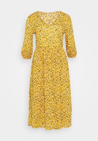 Robe fleurie jaune avec des manches bouffantes trois-quarts, taille cintrée et une jupe fluide ornée de motifs de fleurs blanches et roses.