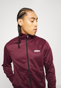 Jack & Jones Performance JCOZPOLY SUIT - Chándal - port royale