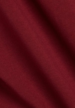 Dark red fabric with a smooth texture, featuring a ribbed pattern and slight stretch. Light reflects subtly off the surface.