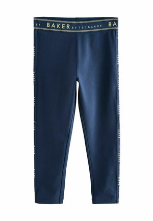 Marineblå leggings lavet af strækbart materiale, med en guld-accenteret taljebånd og vertikal branding langs siderne.