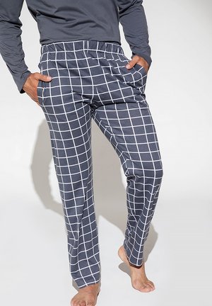 Granatowe spodnie w kratę z białym wzorem, z elastycznym pasem i bocznymi kieszeniami. Materiał wygląda na gładki i lekki.