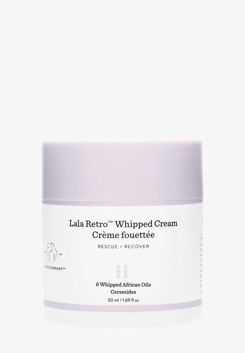 Runder weißer Behälter mit einem helllila Deckel. Der Text auf dem Behälter lautet "Lala Retro Whipped Cream" und "6 Whipped African Oils." Inhalt: 50 ml.