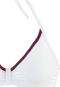 White bikini top featuring a triangular shape, textured red and navy braided trim along the edges, and adjustable straps.