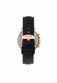 Orologio con cinturino in gomma nera e dettagli in rosa gold, con caratteristiche cronografiche e una fibbia texture. Presenta una cassa metallica rotonda e un quadrante chiaro.