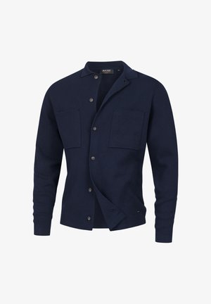 Granatowy sweter z dzianiny z kołnierzykiem, guzikami z przodu, dwoma kieszeniami na piersi i ściągaczami przy mankietach. Miękka tekstura z luźnym krojem.