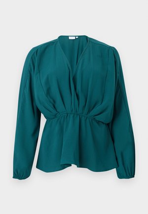 Teal langermet bluse med V-hals, innsvingt midje, puffede skuldre og elastiske mansjetter, vist på en flat hvit bakgrunn.