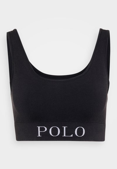 Melns ribots bralete ar platām siksnām, ar vienkāršu joslu, kurā baltiem burtiem ir uzraksts "POLO". Gluda tekstūra, pamata dizains.
