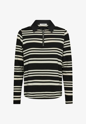 Črna in krema prosojna dolga polo majica z zadrgo na ovratniku. Ima vodoravne proge različnih širina in mehko teksturo tkanine.