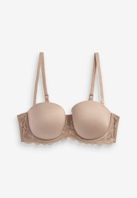 Reggiseno imbottito beige con spalline regolabili e dettagli in pizzo lungo il bordo inferiore e i lati su sfondo bianco.