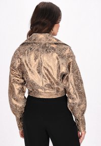 faina Læderjakker - bronze leopard