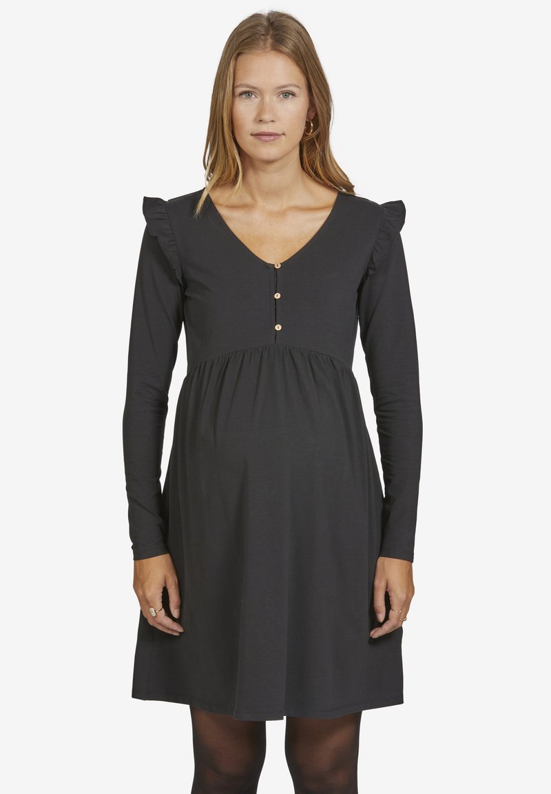 Schwarzes langärmliges Kleid mit V-Ausschnitt, Rüschendetails an den Schultern, Knopfdetails an der Vorderseite und einer lockeren Passform für eine schwangere Silhouette.