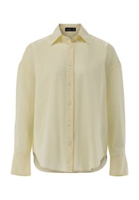 Camicia gialla con bottoni, caratterizzata da un motivo testurizzato. Presenta un colletto a punta, maniche lunghe e un orlo curvo. Realizzata in tessuto leggero.