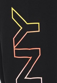 DKNY Teplákové kalhoty - black