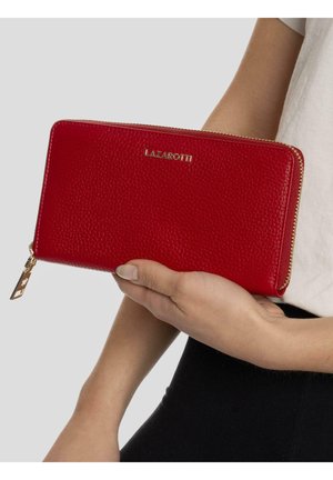 Red textured leather wallet featuring a gold zipper and logo. Shaped rectangular with a zip closure and a keyring accent.