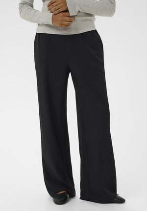 BEATRICE WIDE - Auduma bikses - black deep