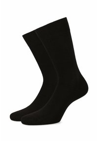 Czarne bawełniane skarpetki w stylu crew o gładkiej teksturze, wzmocnionym nosku i elastycznych ściągaczach dla bezpiecznego dopasowania. Odpowiednie do noszenia na co dzień lub na formalne okazje.