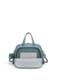 Teal fabric bag with dual handles and adjustable shoulder strap. Features two exterior pockets and a gray fabric lining. Soft texture.