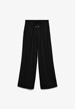 Sorte bukser med vidde i benene, elastisk linning og snøre, løs pasform, ankellængde.