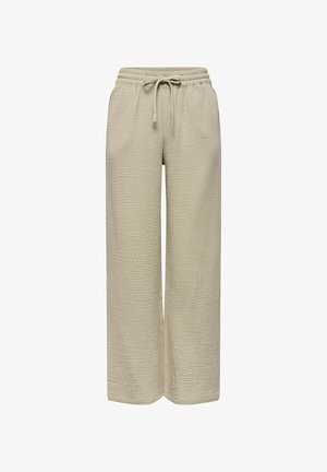 Pantaloni beige a gamba larga con tessuto strutturato e vita elastica con coulisse frontale.
