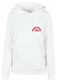 Balts džemperis ar kapuci, izgatavots no kokvilnas maisījuma auduma. Iezīmējas ar priekšējo kabatu, regulējamiem šņorēm un sarkanu izšūtu tekstu: "SAPŅO DÖNER GARŠĪGS UN SVAIGS."