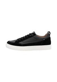 Black sneaker featuring a combination of smooth leather and suede, with a white rubber sole and contrasting lacing. Minimalist design accents.