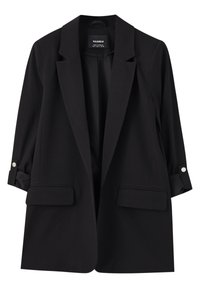 Long blazer noir avec revers, deux poches avant à rabat et manches retroussées maintenues par des boutons.