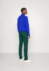Tommy Hilfiger BLEECKER PIMA - Chinos - dark green