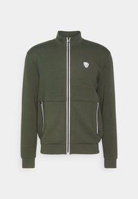 Olivgrön zip-up jacka i mjukt tyg, med hög krage, två sidofickor med svart trim och en märkeslogotyp på bröstet.