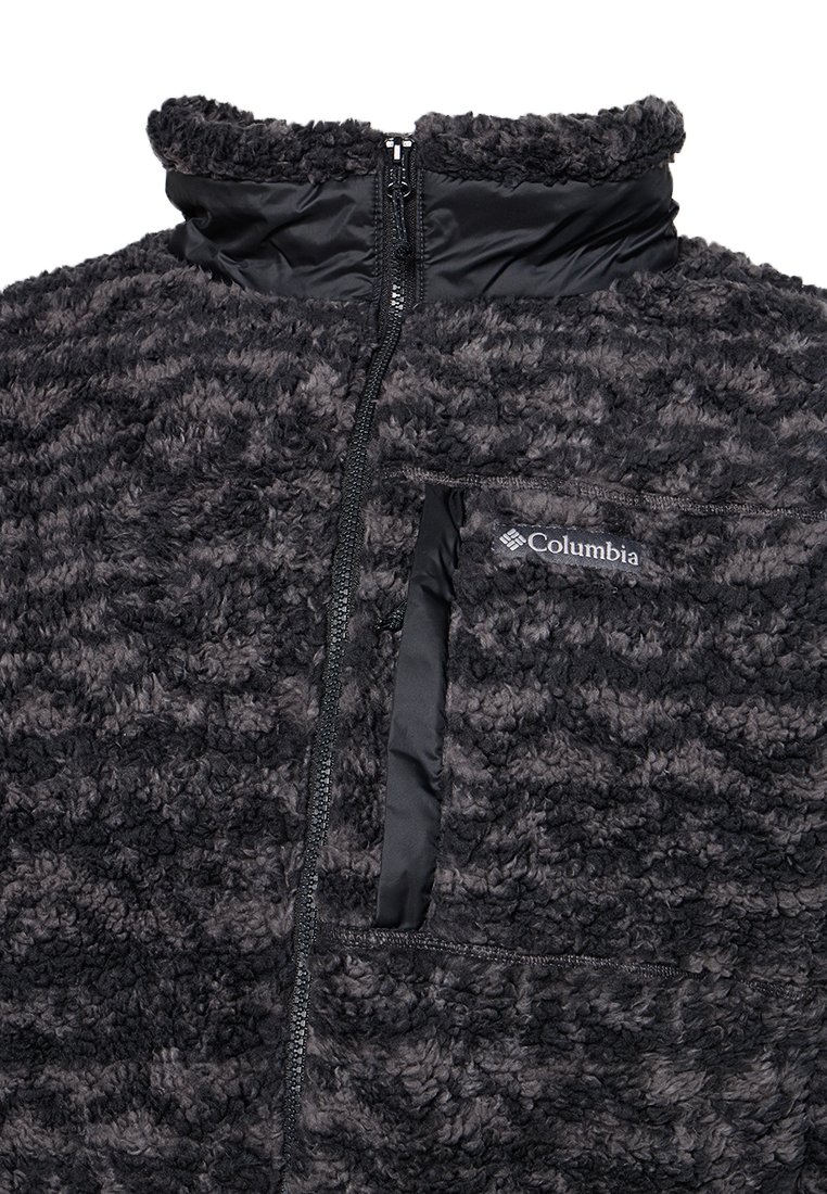 Fleece-Pullover in Schwarz- und Grautönen, mit hohem Kragen und mit einem Reißverschluss versehenen Tasche. Verfügt über einen weichen, strukturierten Stoff mit glatten Akzenten.