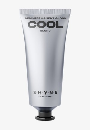 Sølvfarvet tube med semi-permanent hårglans mærket "COOL BLOND." Har fed sort tekst og en sekskantet hætte i bunden.