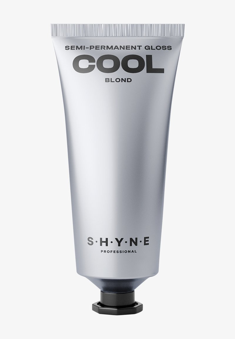Srebrna tubka półtrwałego połysku do włosów oznaczona etykietą "COOL BLOND." Posiada wyraźny czarny napis oraz sześciokątną zakrętkę u podstawy.