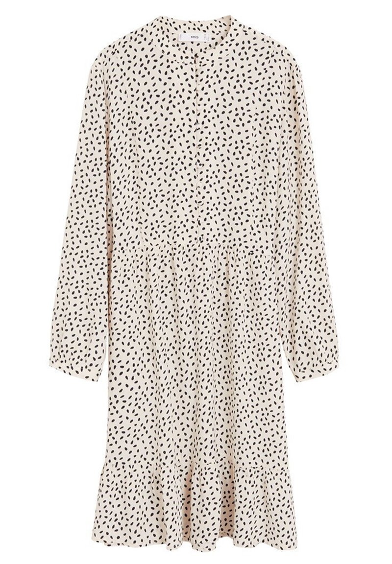 Robe crème à manches longues avec un motif de points noirs irréguliers, devant boutonné, col et ourlet froncé.