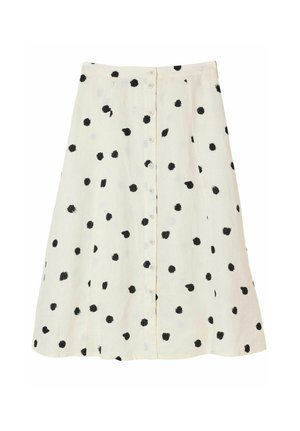 Hvid A-formet nederdel med sorte uregelmæssige polkaprikker og lukning med knapper foran.