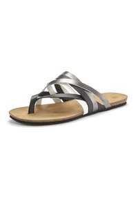 Sandale à lanières avec un mélange de bandes noires, blanches et argent métallisé. Semelle extérieure légère avec un intérieur texturé marron. Design à bout ouvert.