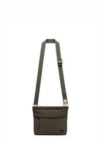 Geantă crossbody de culoare verde măslin, fabricată dintr-un material textil cu un design structurat, având o închidere cu fermoar, un buzunar frontal și o curea ajustabilă.