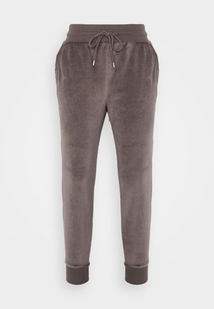 Soft, gray-brown velour jogger pants with an elastic waistband, drawstring, side pockets, and ribbed cuffs at the ankles.