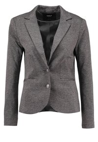 Grijze op maat gemaakte blazer van een gladde, gestructureerde stof. Voorzien van opstaande revers, twee voorzakken en een dubbele knoopsluiting.