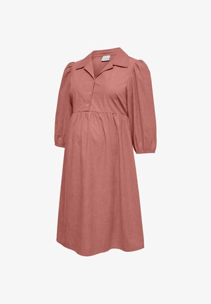 Netīrā rozā grūtnieču kleita ar savāktu imperatoru jostu, trīs ceturtdaļu izmēra pūkainām piedurknēm, apkakli un pogotu priekšpusi.