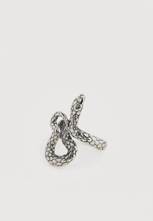 Silver snake-shaped ring with detailed scales, coiled with head raised against white background.