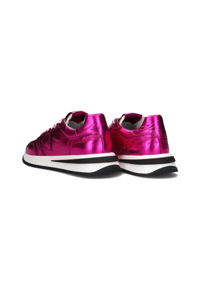 Pink metallic sneakers with a smooth finish, white midsole and black outsole, featuring classic laces and padded collar for comfort.