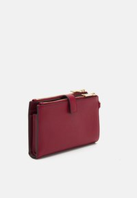 MICHAEL Michael Kors JET SET WRISTLET - Piniginė - deep red