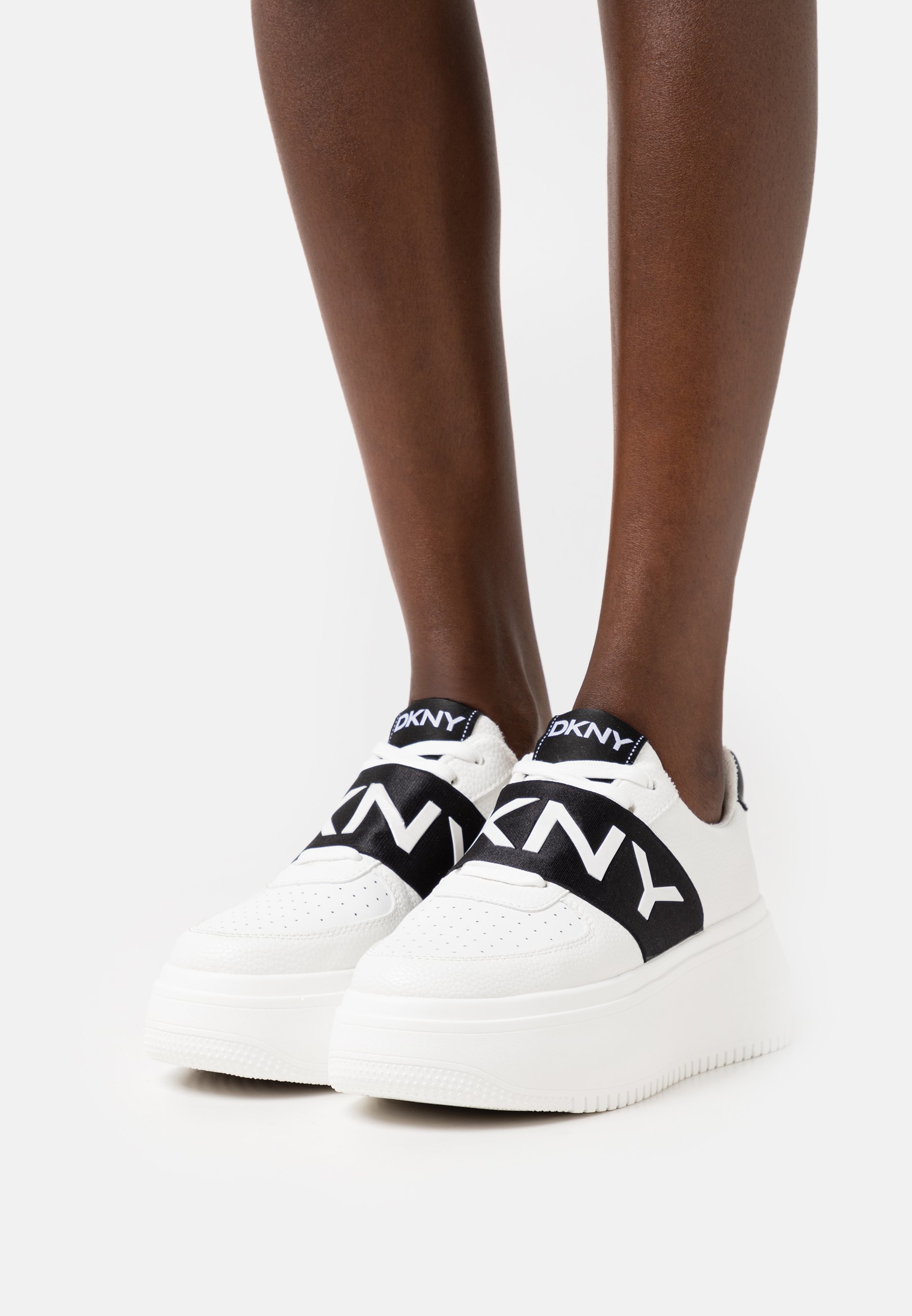 dkny slip on trainers white