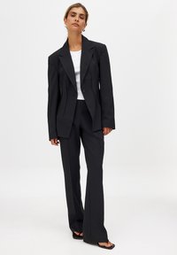NA-KD Trousers - black