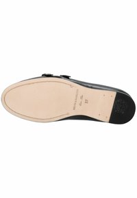 Suola di scarpa in pelle nera con finitura liscia, interno beige, forma arrotondata e dettagli del marchio incisi. Taglia 37 indicata sulla soletta.