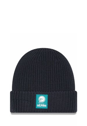 Dunkelblaue Strickmütze mit einem gerippten umgeschlagenen Bund. Enthält ein quadratisches Logopatch in Türkis mit einem Delfin-Graphic und dem Text "MIAMI DOLPHINS."