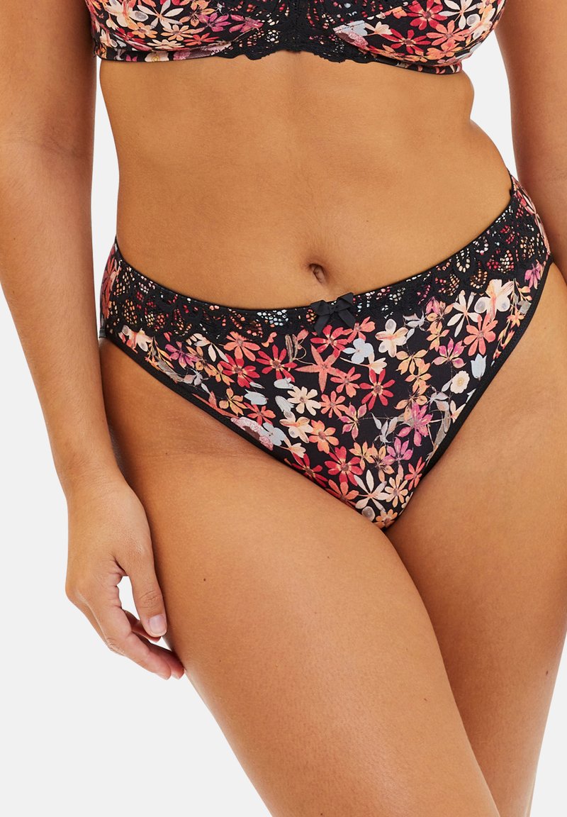Bas de bikini fleuri avec une base noire ornée de motifs de fleurs colorées en rose, blanc et bleu. Comprend une bordure en dentelle et un petit nœud décoratif.