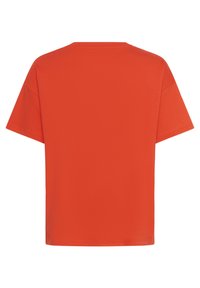 T-shirt à manches courtes, coupe décontractée, en orange vif, fabriqué en coton lisse. Présente un col rond simple et aucun logo ou motif visible.