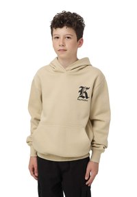 Felpa beige con tasca frontale, cappuccio con stringhe e logo nero sul petto. Maniche lunghe con polsini a costine, tessuto morbido in misto cotone.