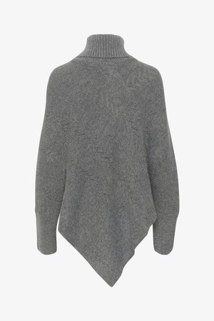 Poncho grigio lavorato a maglia con colletto alto a coste, caratterizzato da un orlo asimmetrico e un motivo testurizzato su tutta la superficie.